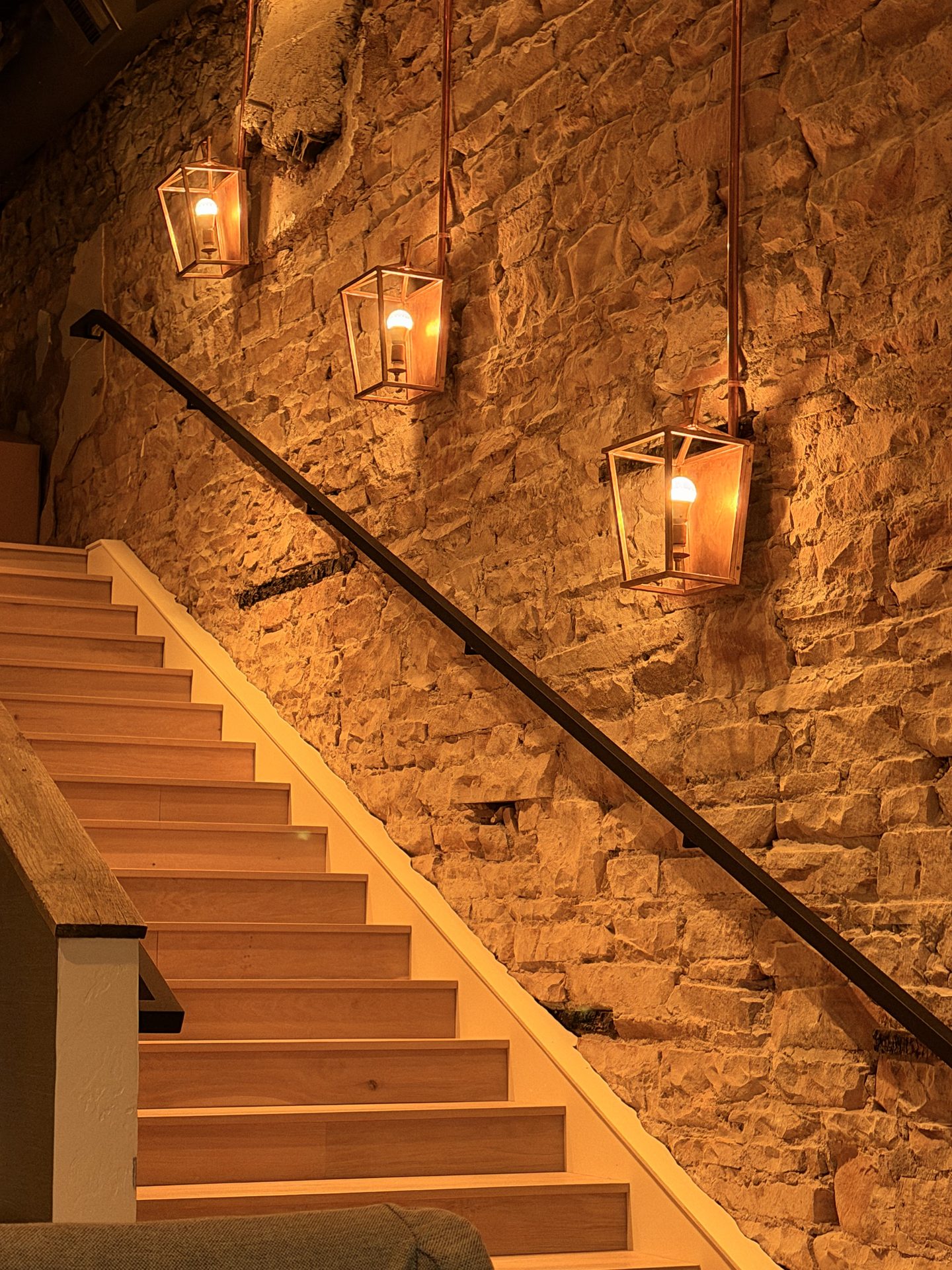 Cast Showroom — Architectural Lanterns on Stone Wall Staircase
